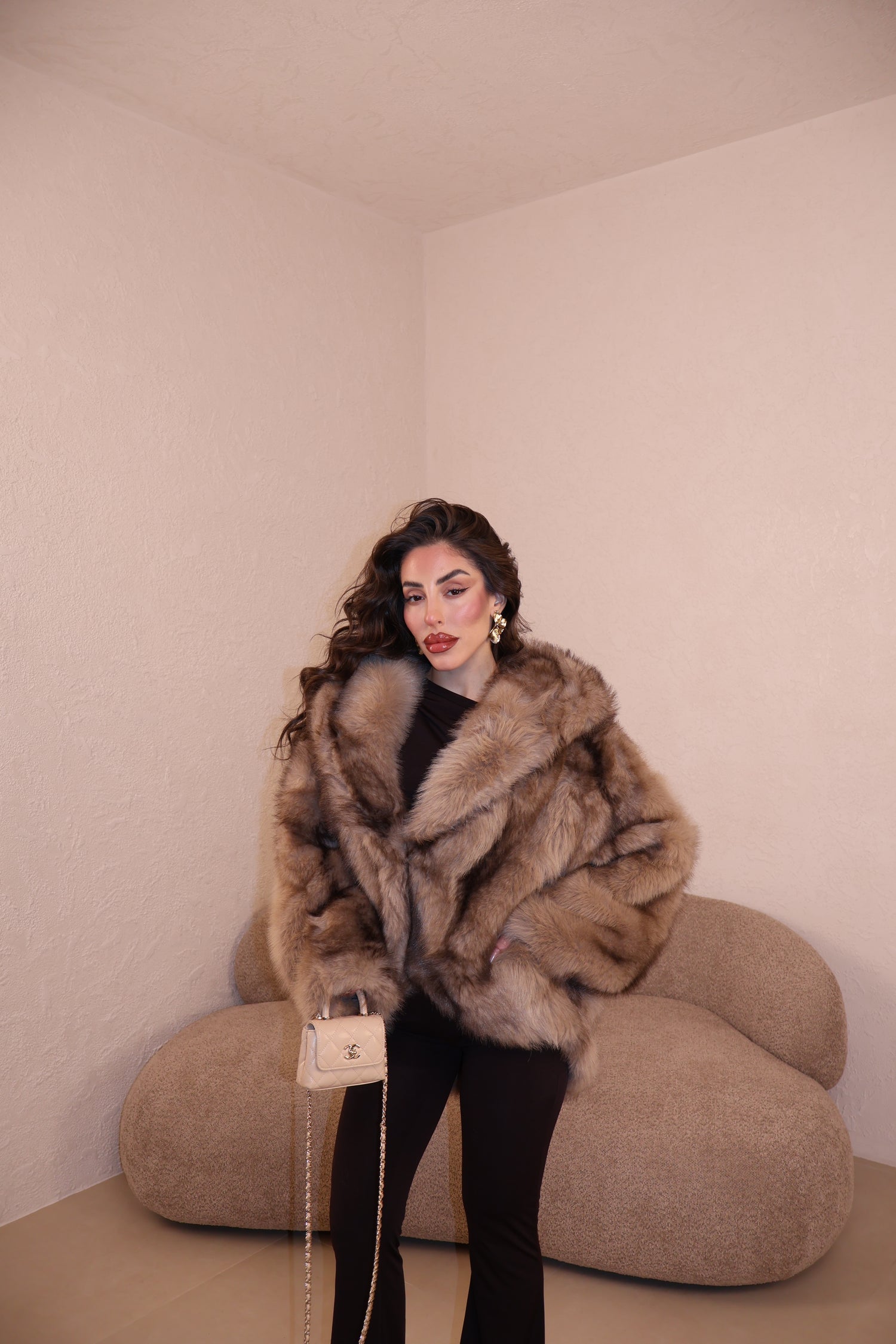 Pelliccia Roma fango